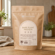 Bare Blends Bare Plant Protein 750g pouch on a sunlit kitchen bench